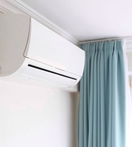 modern-air-conditioner-on-white-wall-indoors-2025-01-08-10-09-33-utc